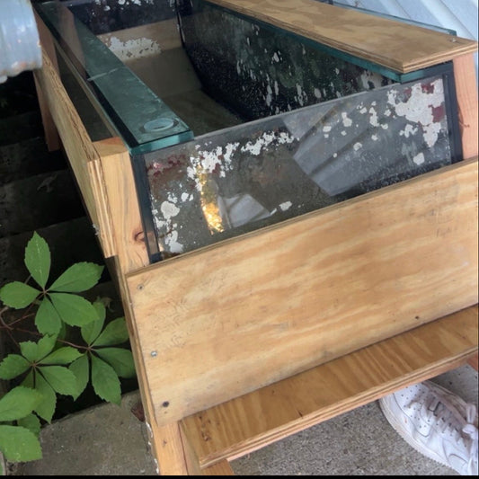 Moving a massive tank down stairs in a cradle LOL